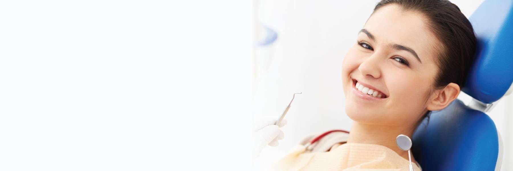 woman sitting in a dental chair