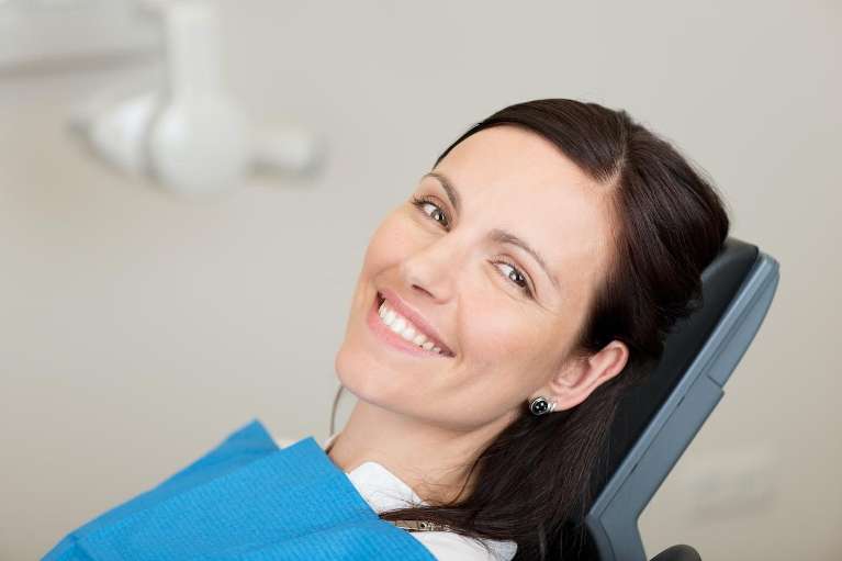 woman sitting in a dental chair